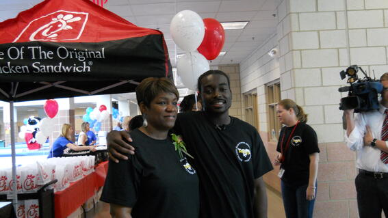 Rashawn and his mom at his wish