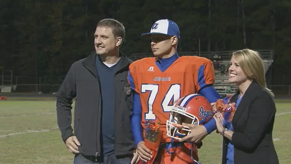 Coby and his family at his final high school football game