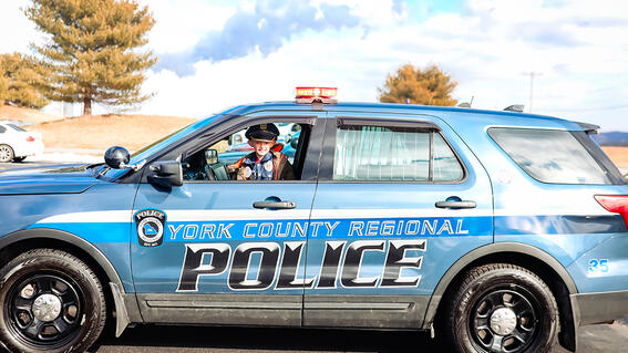 Landen sits in the cruiser, ready to go on patrol.