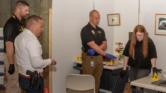 Margaret with BCA staff investigating crime scene. 