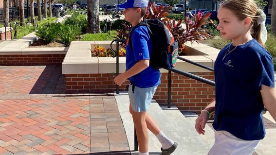 Levi Walking UF Campus