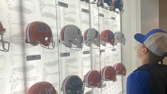 Levi looking at UF Helmets