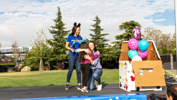 Bridget hugs wish granters during her wish reveal. 