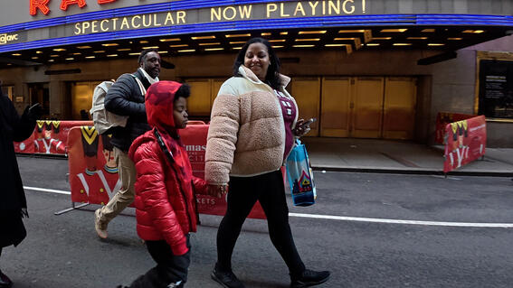 Austin and his Mom walking in NYC