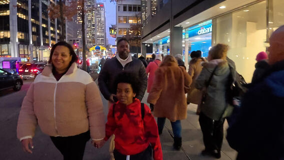 Austin and his family walking NYC
