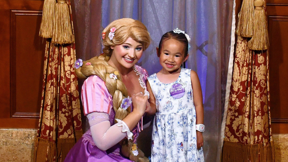 Wish kid Riley with Princess Rapunzel