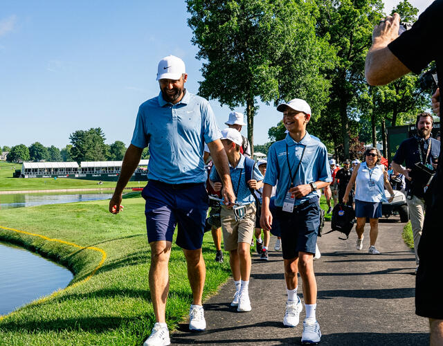 Wish kid Caleb with golfer Scottie Scheffler