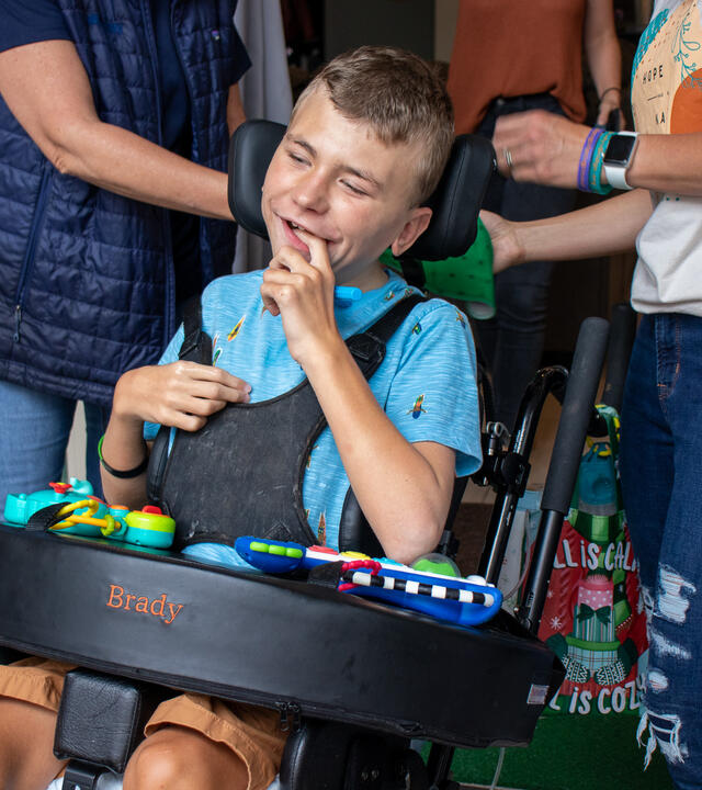 Brady Smiling in his wheelchair