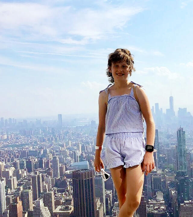 Wish Kid Alice in front of NYC Skyline