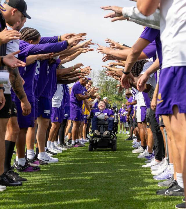 Nash wheeling through a tunnel of vikings players