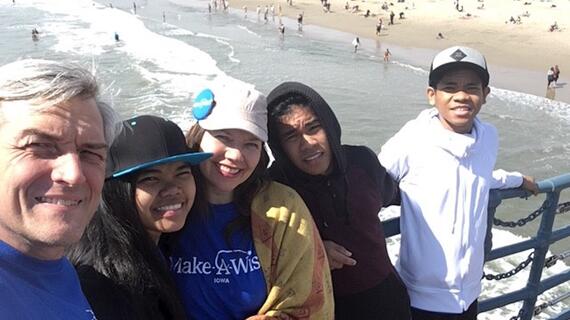 Family on beach pier 