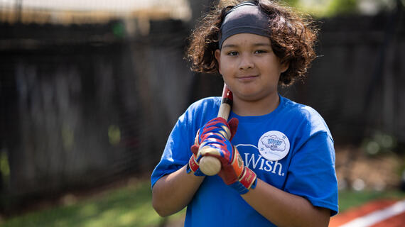 Fernie with a bat on his shoulder