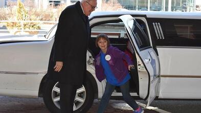 Ellen coming out of the limo 