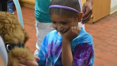 Wish kid Polet smiling 