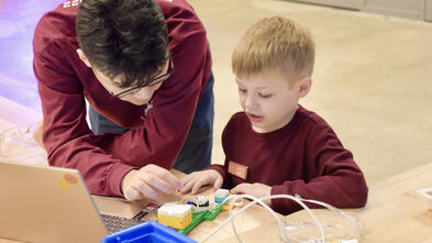 Grant building a robot