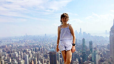 Wish Kid Alice in front of NYC Skyline