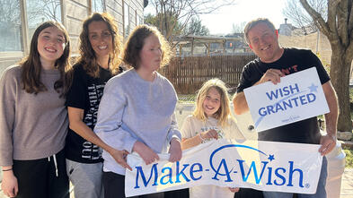 photo of Oliana and her family on wish day