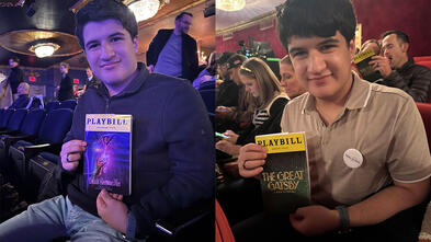 Vincent holding a playbill