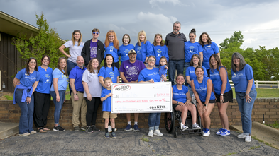 KTCS 2026 Event photo with grand total outside station