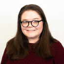 Katie smiling in a photo