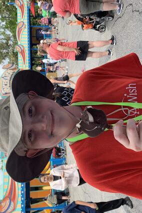 Edward enjoying a Mickey ice cream bar on his wish trip