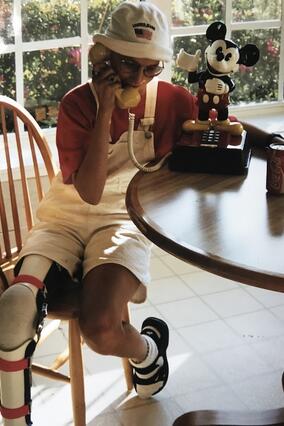 Wish alum Jen on the phone