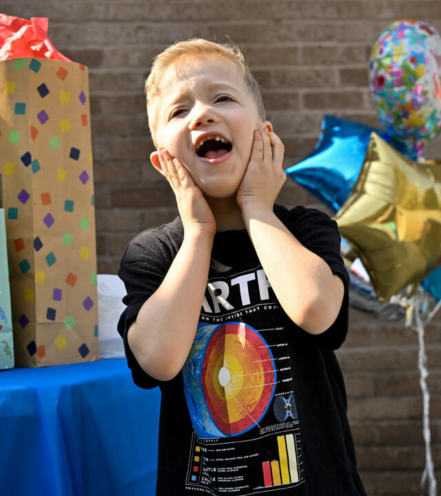 Wish Kid Archer at wish celebration surprised face 