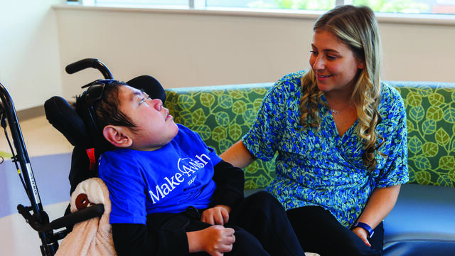 Alyssa talking to Wish Kid Reison
