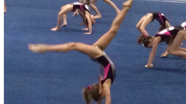 Ella doing gymnastics