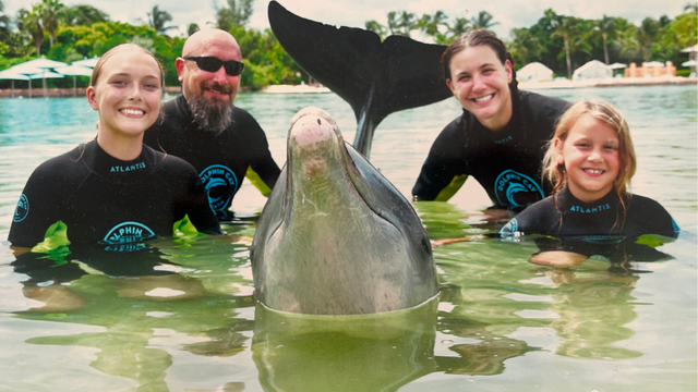Jones family with Cosmo the dolphin